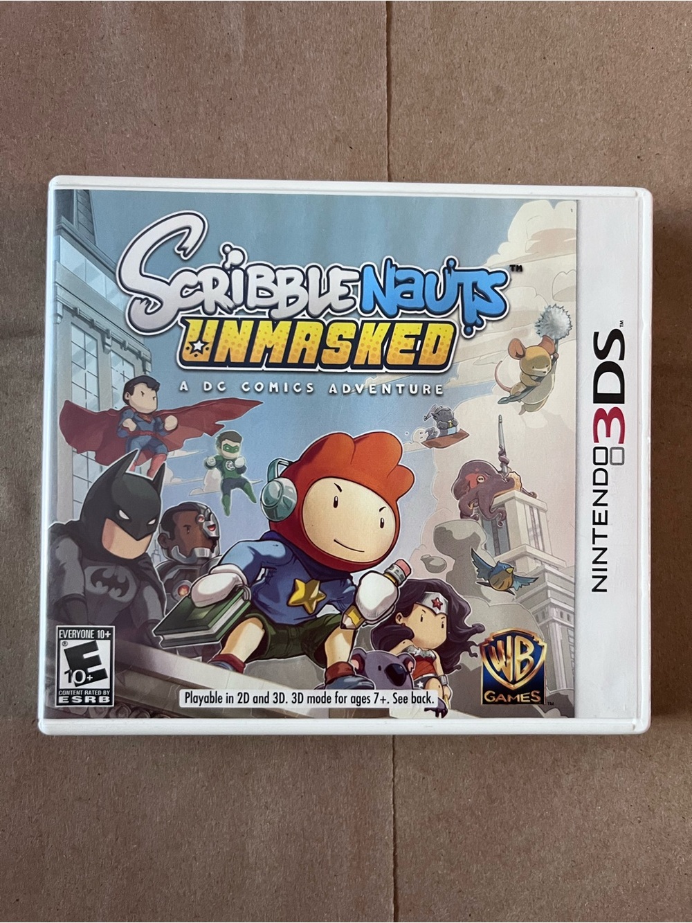 Nintendo 3DS Scribblenauts Unmasked - White, Blue and Yellow Cover